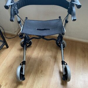 Compactable 4 wheeler rollator walker with seat used once 