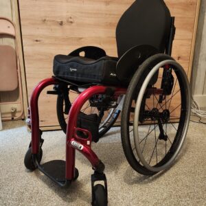 Ki Rogue XP Adolescent size Manual Wheelchair With Axiom Back And Seat Cushion.