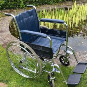 wheelchair used folding with footrests