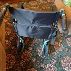 Escape light . lightweight folding self propelled wheelchair